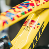 Born in the 80's colour bike frame protection kit, with the close up of the primeval logo on a yellow bike.