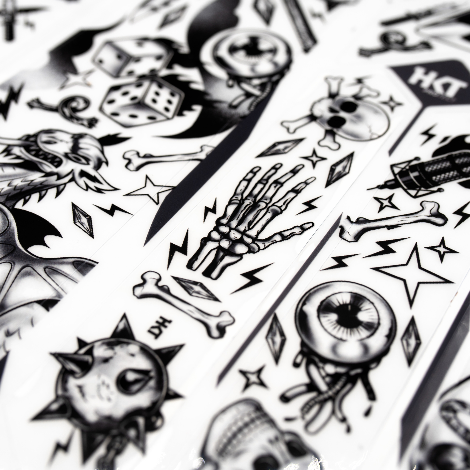 Collection of black and white designs on a white background.