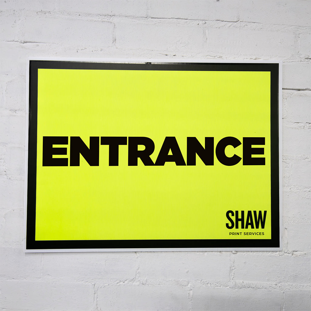 Entrance landscape sign for an event.