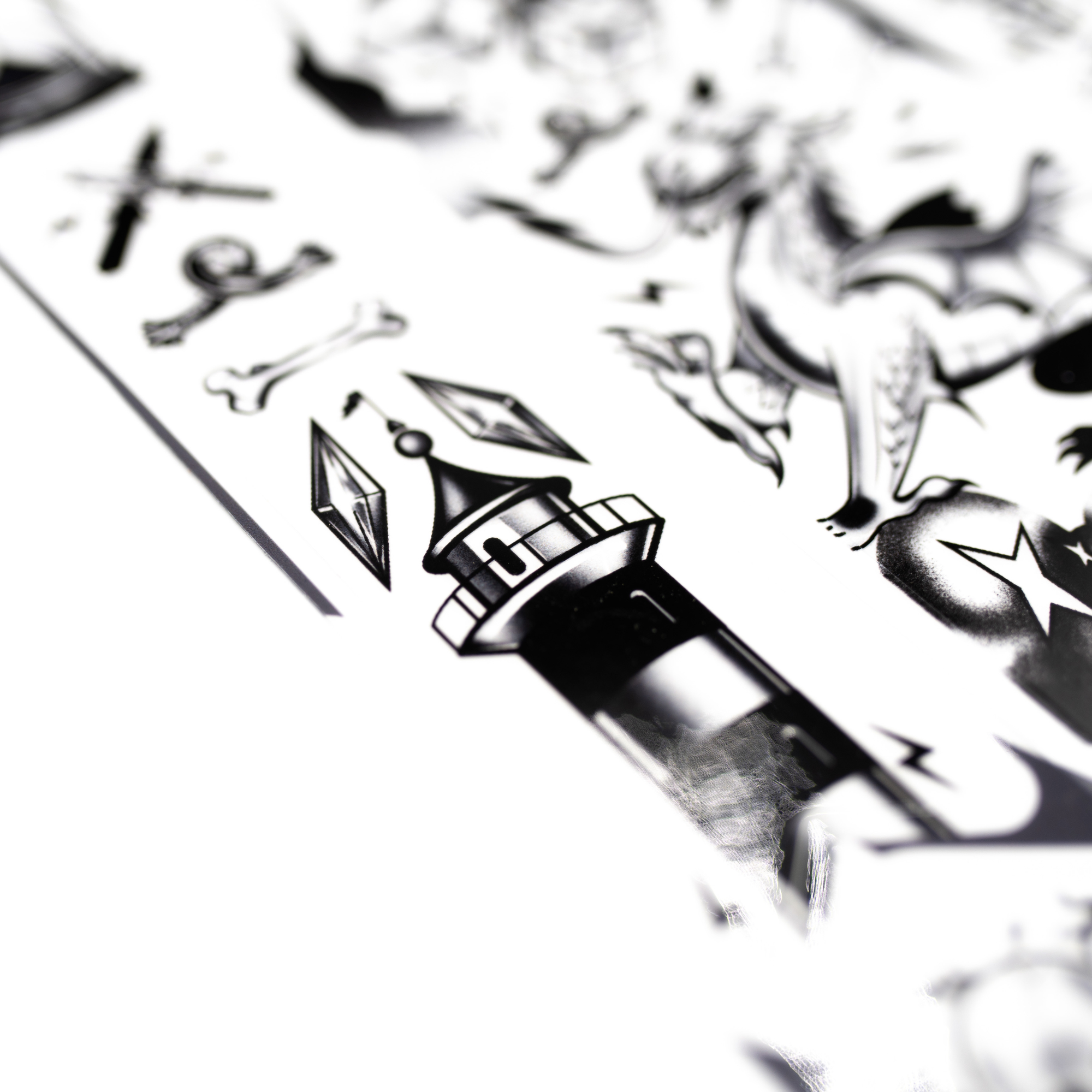 Black and white design of a lighthouse with stars and other elements on a white background.