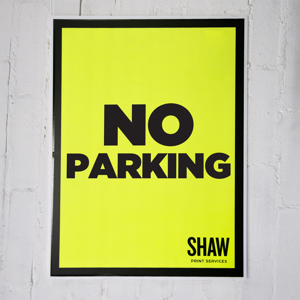 No Parking Event Sign in fluorescent yellow with black text.