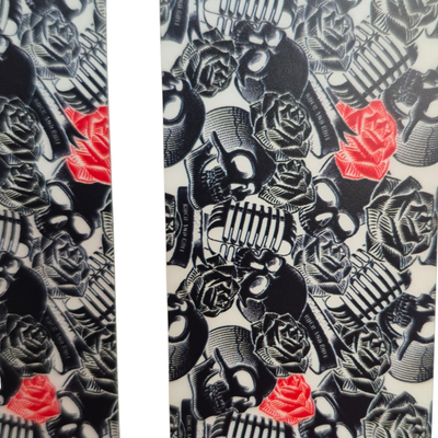 Patterned bike frame protection kit with black and red design on a white background