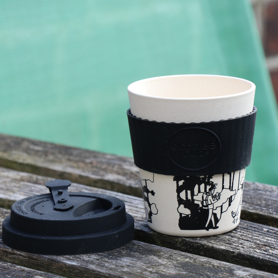 Trash Free Trails Kickback Coffee Cup with the lid at the side. 