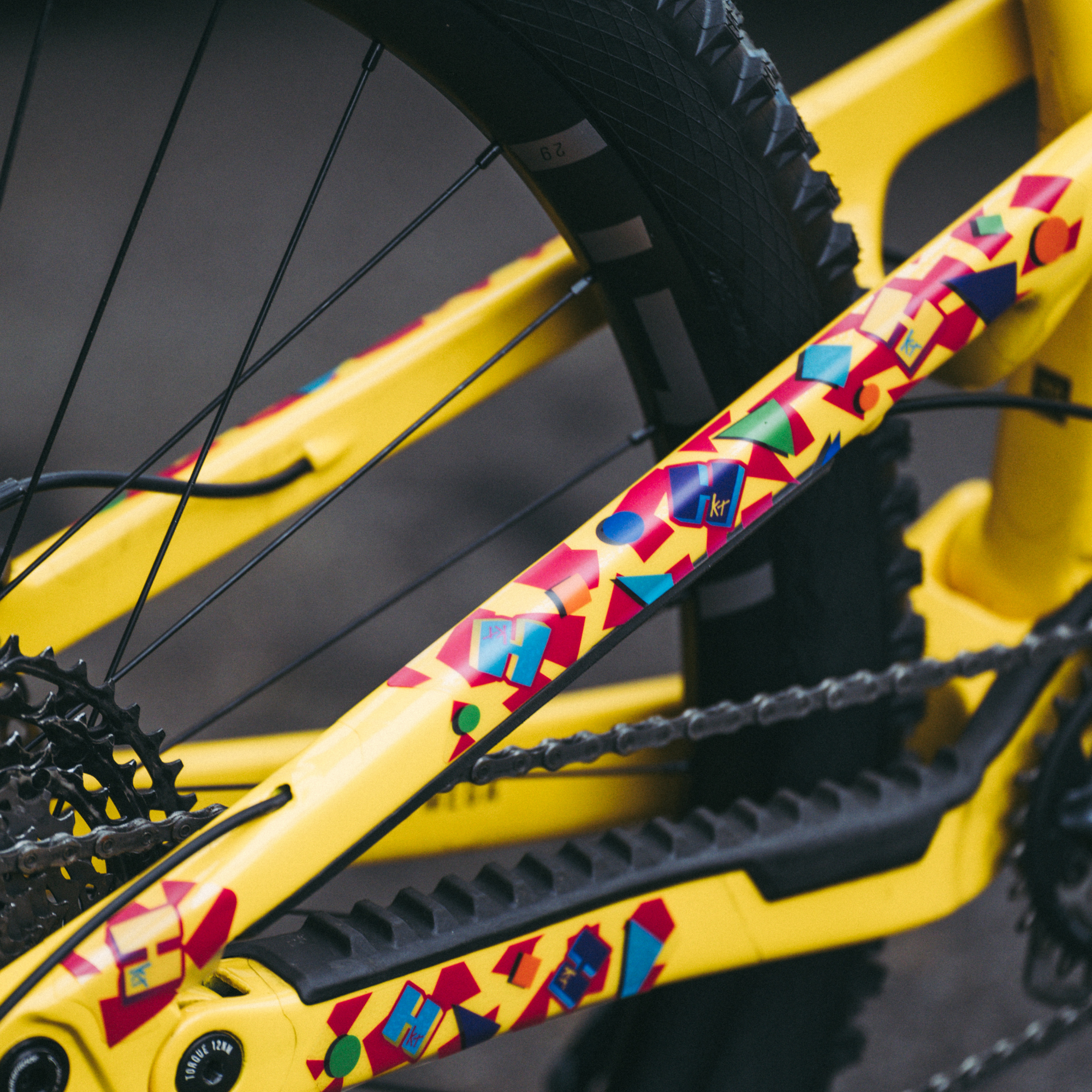 Born in the 80's colour frame kit on a yellow mountain bike.