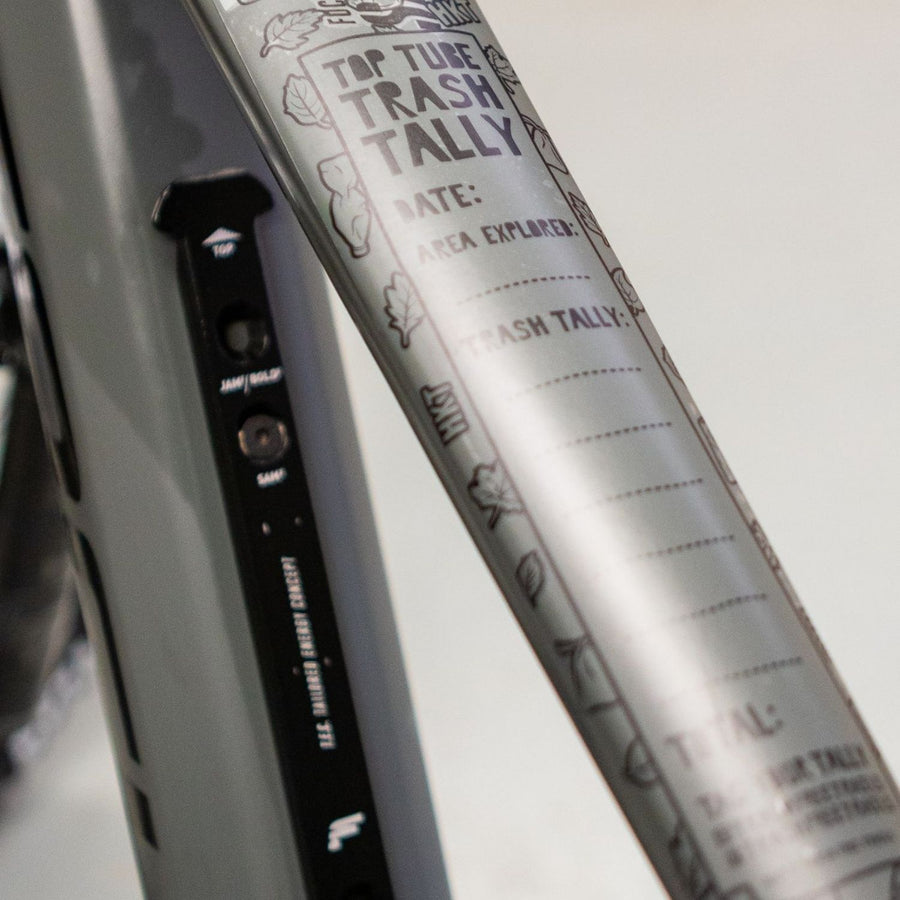 The Black Trash Free Frame Kit on a silver bike frame. 