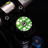 Wild Style Green Stripe Stem Cap with silver bolt.