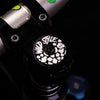 Wild Style Text black stem cap with black bolt.