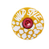 Wild Style Text gold stem cap with red bolt.