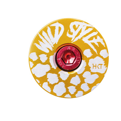 Wild Style Text gold stem cap with red bolt.