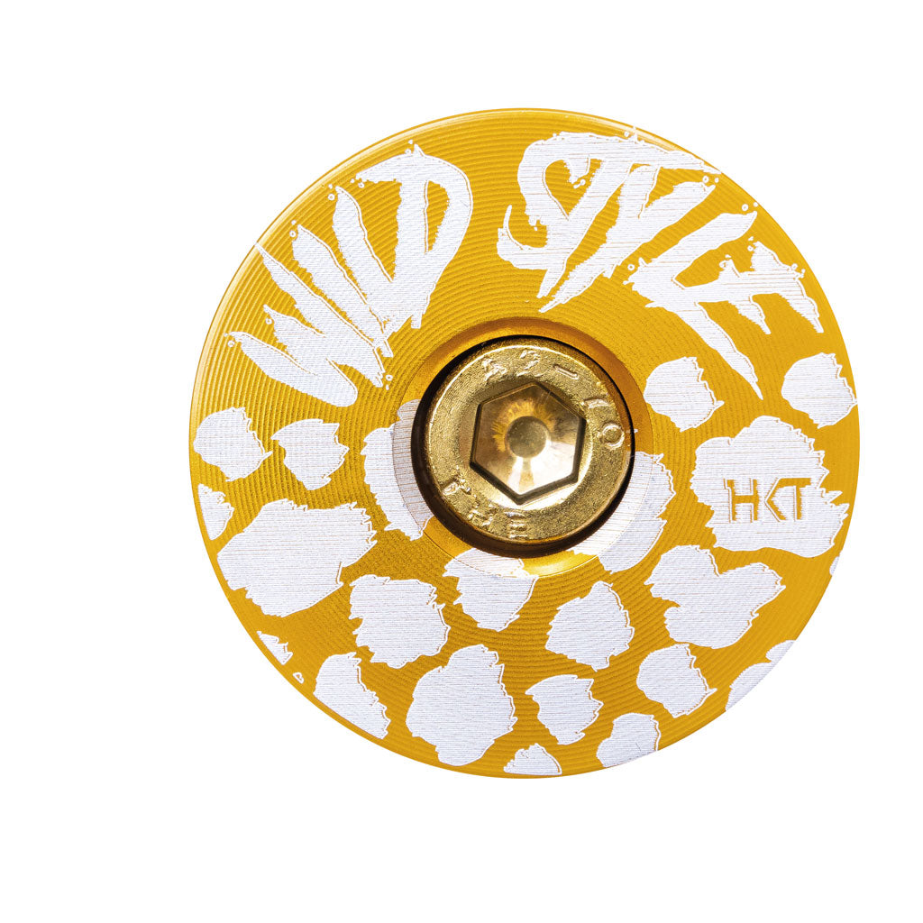 Wild Style Text gold stem cap with gold bolt.