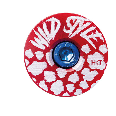 Wild Style Text red stem cap with blue bolt.