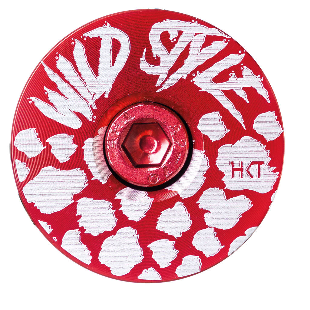 Wild Style Text red stem cap with red bolt on a white background.
